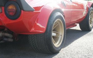 Rear quarter view of Group 4 wheels on car